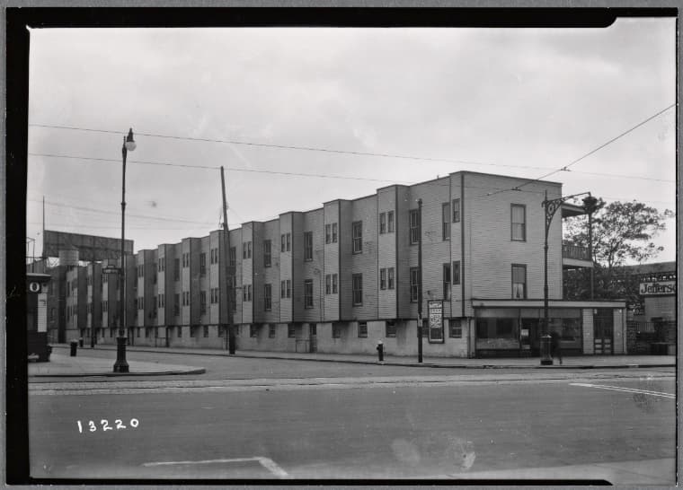 Rear view of row houses' view of El station: Surf Av - W. 15th St, Brooklyn, 1934