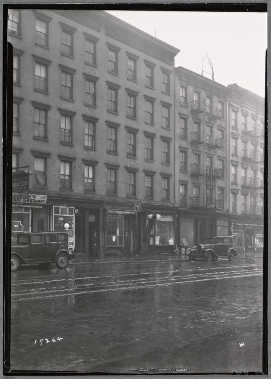 Tenements & storefronts; Jack's Deli, Frank Garfinkel Drugs: 135-141 Ave A-St Marks-E. 9th St., Manhattan, 1936