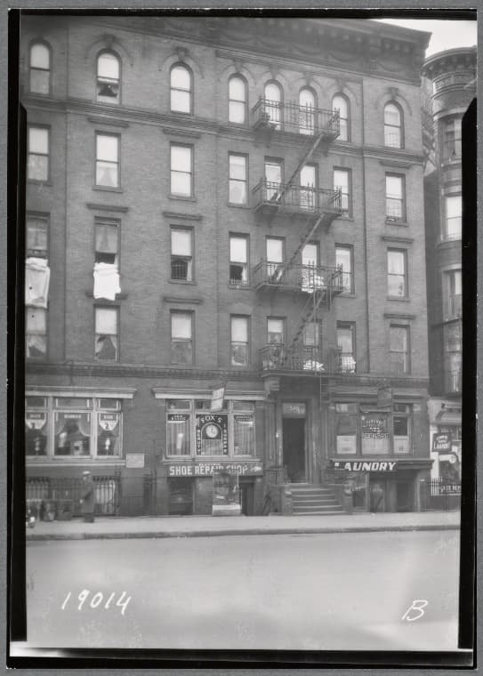 Tenements & storefronts; Fox's Beauty Shop, Parkway Restaurant: 540 Claremont Av-3rd Av-Fulton Av, Bronx, 1938