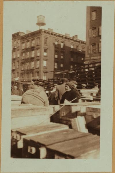 Fulton fish market - [Purchasers examining packaged fish in the middle of Peck Slip.], 1923