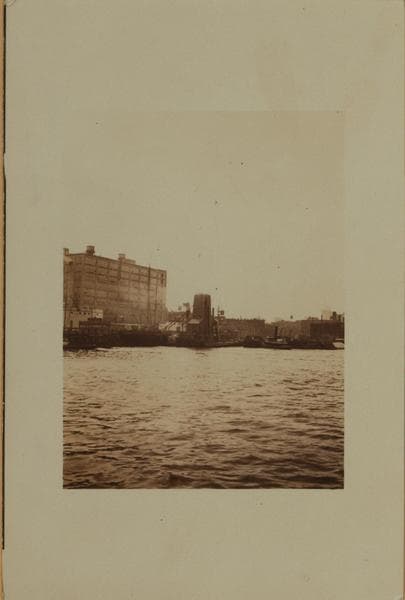East River - Shore and skyline of lower Manhattan - South Ferry - Williamsburg Bridge - [Moore and McCormick piers.], 1926