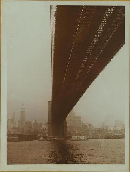 Bridges - Brooklyn Bridge - [View of the bridge over East River, as it stretches from Brooklyn to Manhattan.]