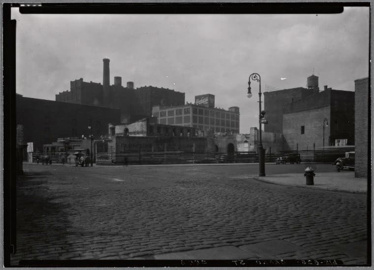 Demolition of Louis Greenberg Plumbing Supplies: 618-628 Grand St.- East St., Manhattan, 1934