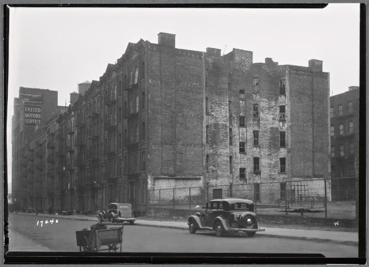 Vacant tenement row; playground; United Motors Service: W. 64th St.-Amsterdam-West End, Manhattan, 1937