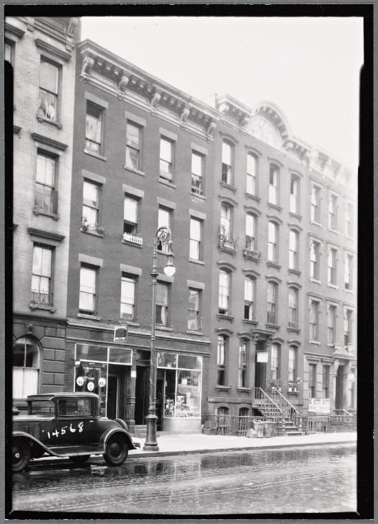 Storefronts and tenements; M. Asinofsky Fancy Groceries: 300-310 E. 80th St.-2nd Ave., Manhattan, 1935
