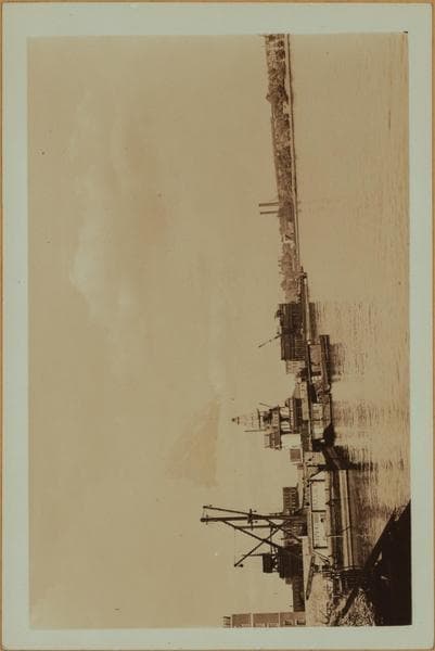 East River - Shore and skyline of Manhattan from East 94th Street - Queensborough Bridge - [Consolidated Edison Company.], 1934–1935
