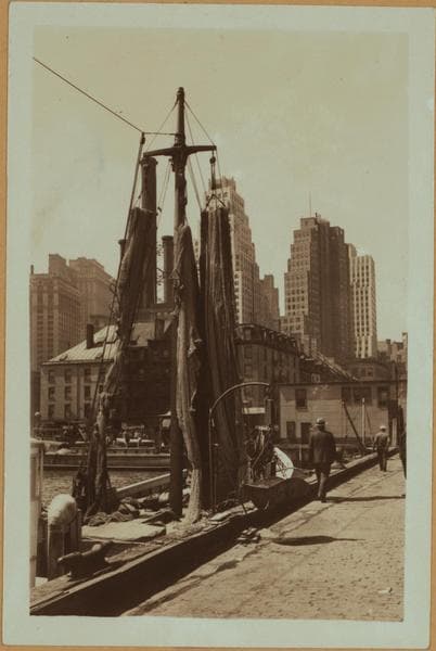 Fulton fish market in Manhattan - [Fishing nets being dried on vessels at docks.], 1933