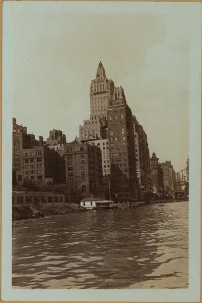 East River - Shore and skyline of Manhattan between East 49th and 53rd Streets - Williamsburg and Queensborough Bridges - [United States Volunteer Life Saving Corps.], 1933–1934