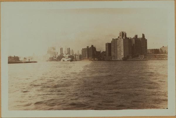 East River - Shore and skyline of Manhattan from East 85th Street - Queensborough Bridge - [Interboro Rapid Transit Building; New York Hospital; Yorkville Ice Sales Corporation.], 1931–1933