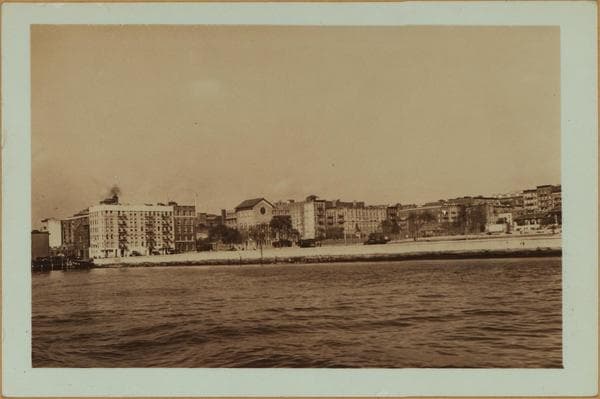 East River - Shore and skyline - Manhattan - South Ferry - Williamsburg Bridge - [Corlears Hook Park - St. Mary's Roman Catholic School.], 1935