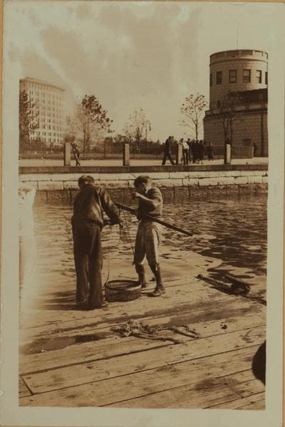 Recreation and hobbies - Fishing [off the police dock at Battery Park.], 1933