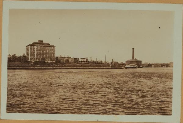 East River - Shore and skyline of Manhattan from East 86th Street - Queensborough Bridge - [Doctor's Hospital ; Municipal Asphalt Plant.], 1931–1934