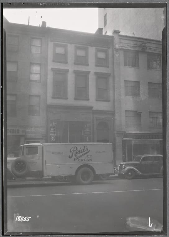 Brownstones & storefronts; M. Busi Dry Cleaning, Altenburg Pianos: 57-61 Fifth Av-E. 13th St, Manhattan, 1938