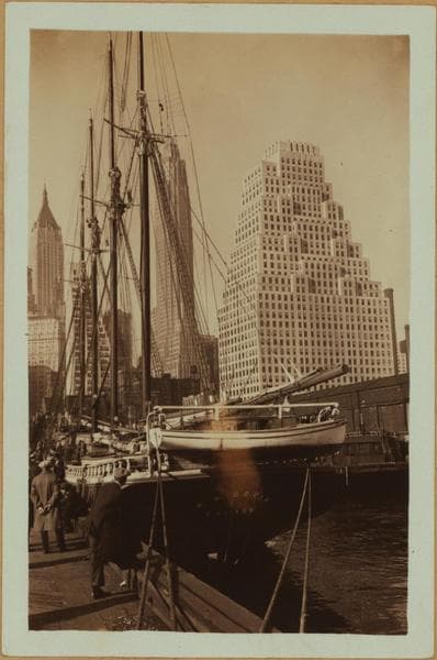 East River - Shore and skyline - South Ferry - Williamsburg Bridge - [Bank of Manhattan - 60 Wall Street Tower - American Sugar Refining Company.], 1933