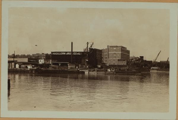 East River - Shore and skyline of Manhattan between East 97th and 99th Streets - Queensborough Bridge - [Hagedorn Brothers Coal Company ; Burns Bros. Coal Co.], 1934–1936