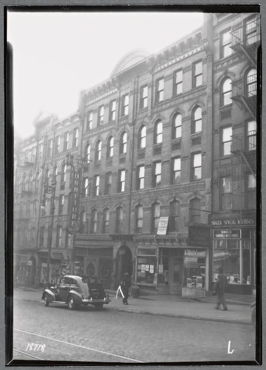 Tenements & storefronts; Singer Sewing Machines, Union Furniture: 304-310 W. 145th St.-Bradhurst Av, Manhattan, 1938