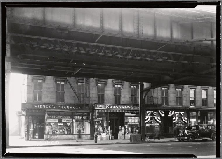 Storefronts under elevated train tracks: 1746-1752 Fulton St - East New York Av, Brooklyn, 1934