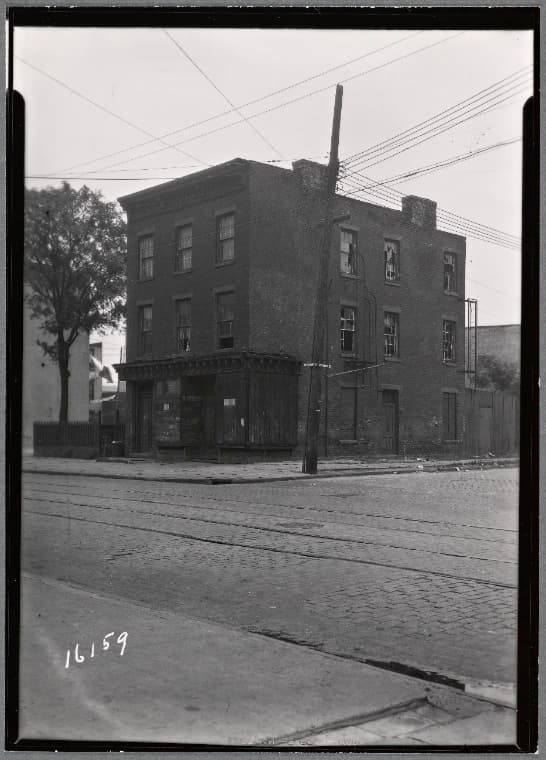 Brick building with vacant storefront: Van Brunt St. - Delavan St., Brooklyn , 1936