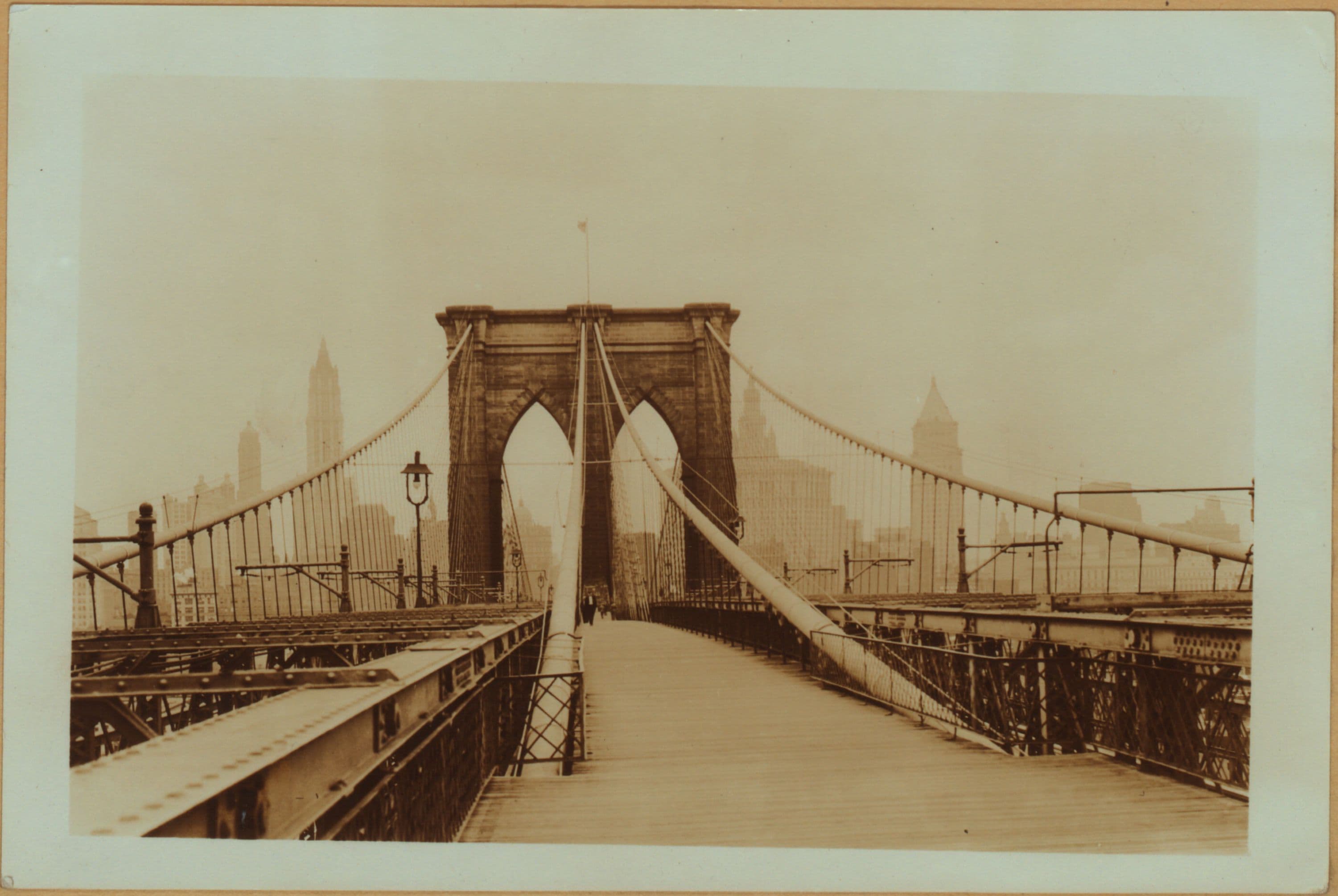 Bridges - Brooklyn Bridge - [views showing lower Manhattan].
