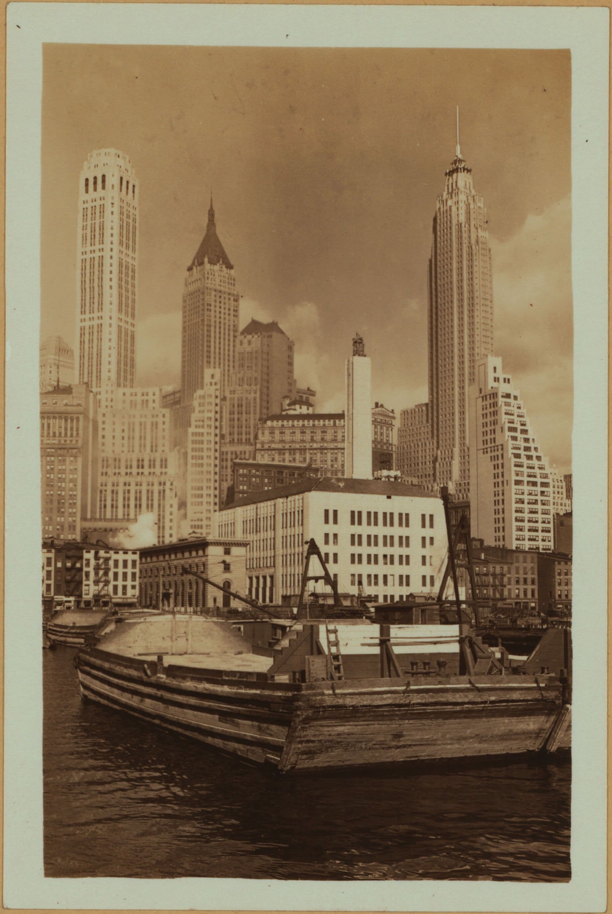 East River - Shore and skyline of lower Manhattan - South Ferry - Williamsburg Bridge - Guylers Alley - Old Slip.