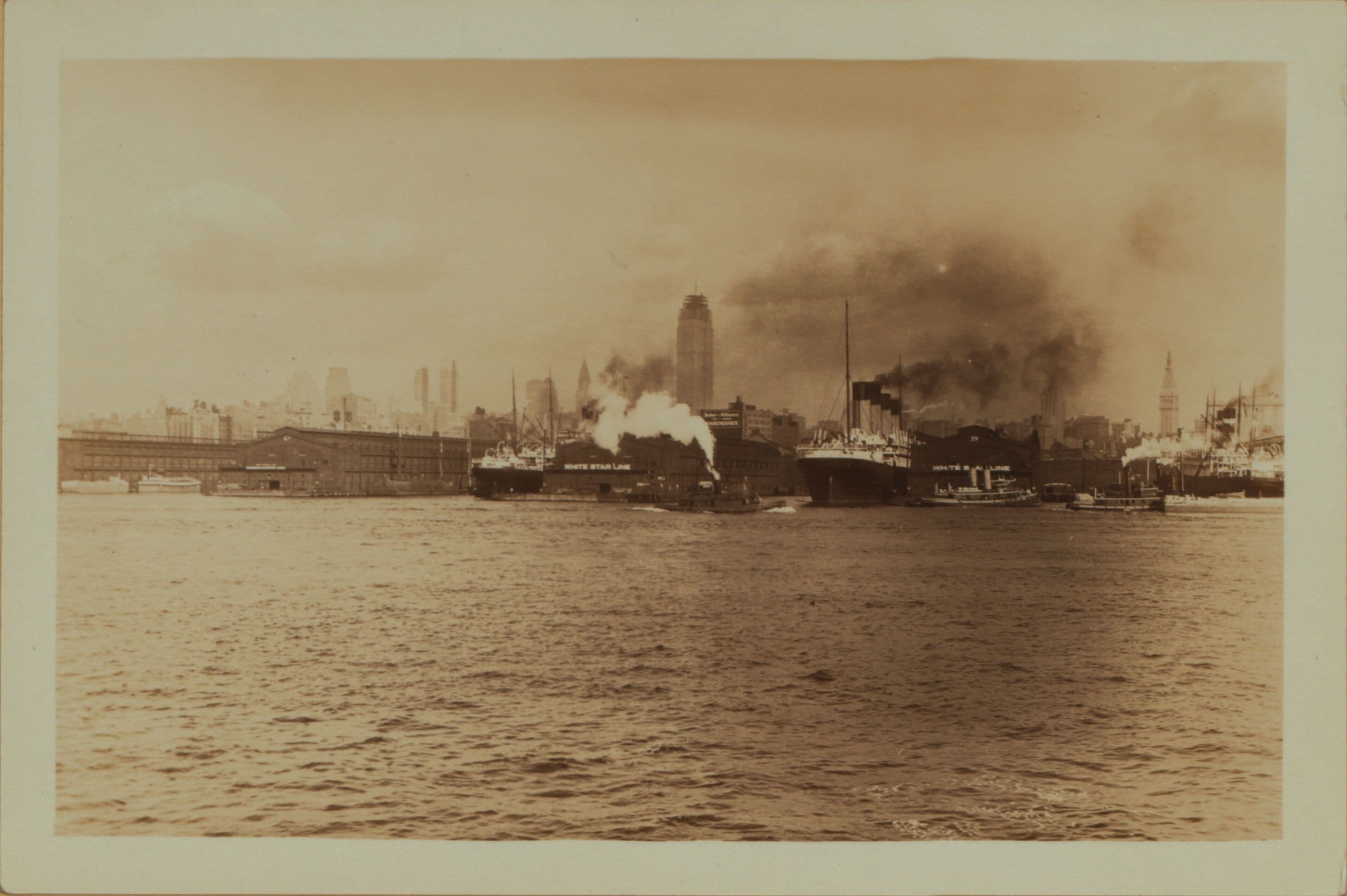 North (Hudson) River - Shore and skyline - Manhattan - [Midtown skyline between 14th and 59th Streets - Empire State Building - Piers 58, 59, 60 and 61 ; S. S. Leviathan.]