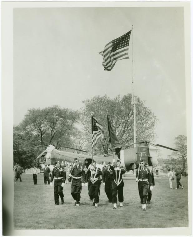 Flag bearers march at Fort Totten, New York]