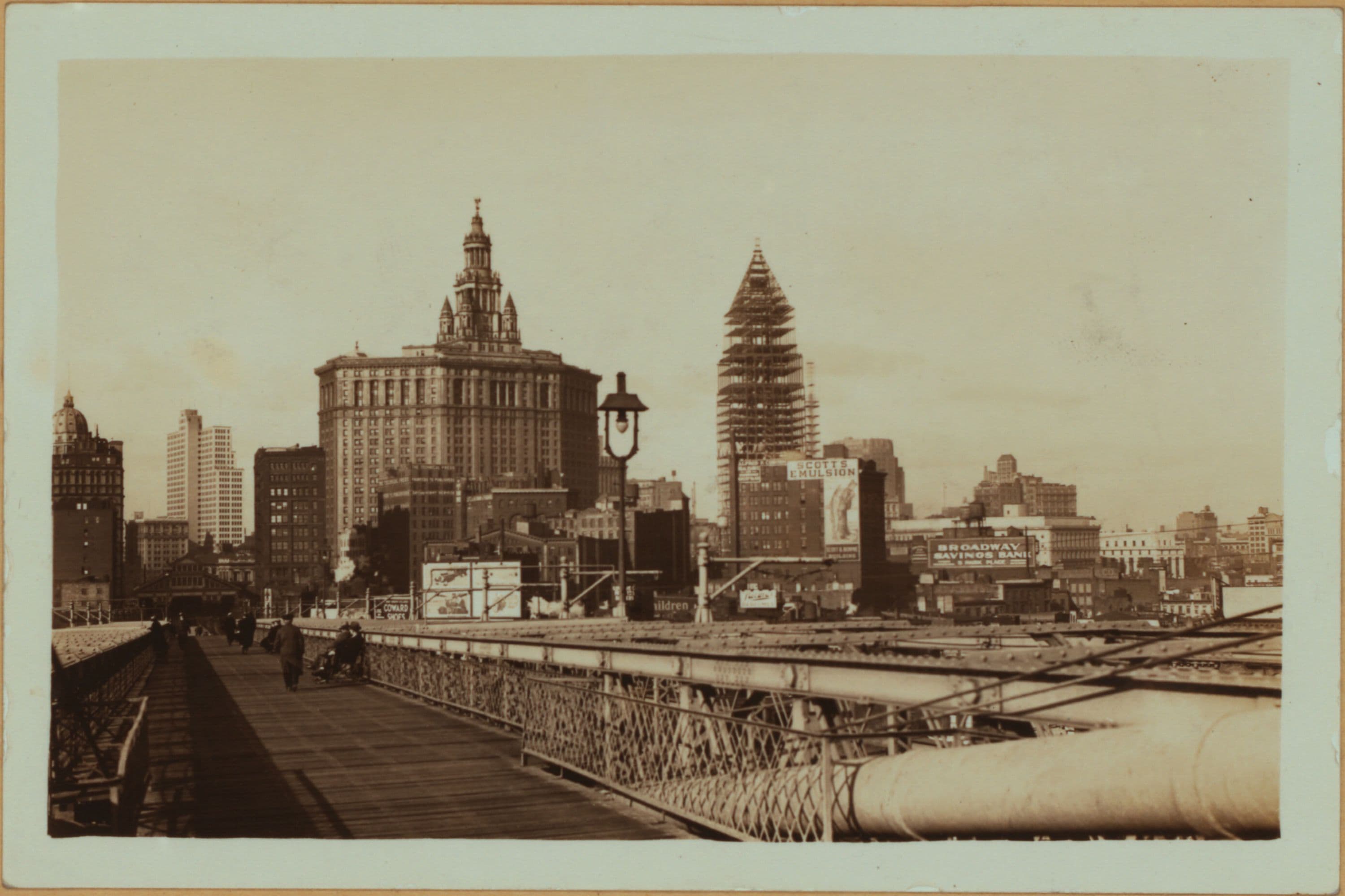 Bridges - Brooklyn Bridge - [views showing lower Manhattan].