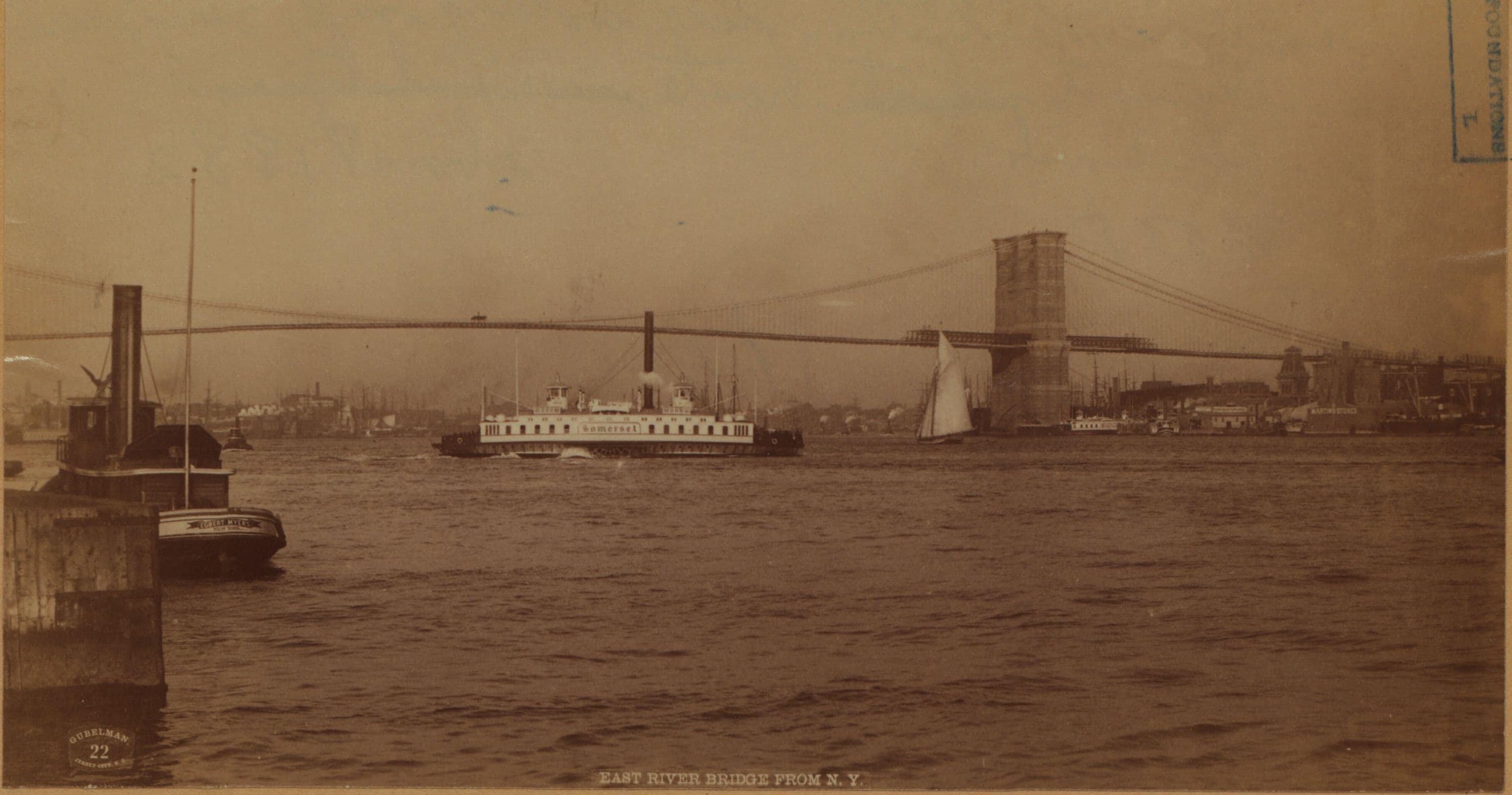 Bridges - Brooklyn Bridge - [View of the bridge from a Manhattan pier.]