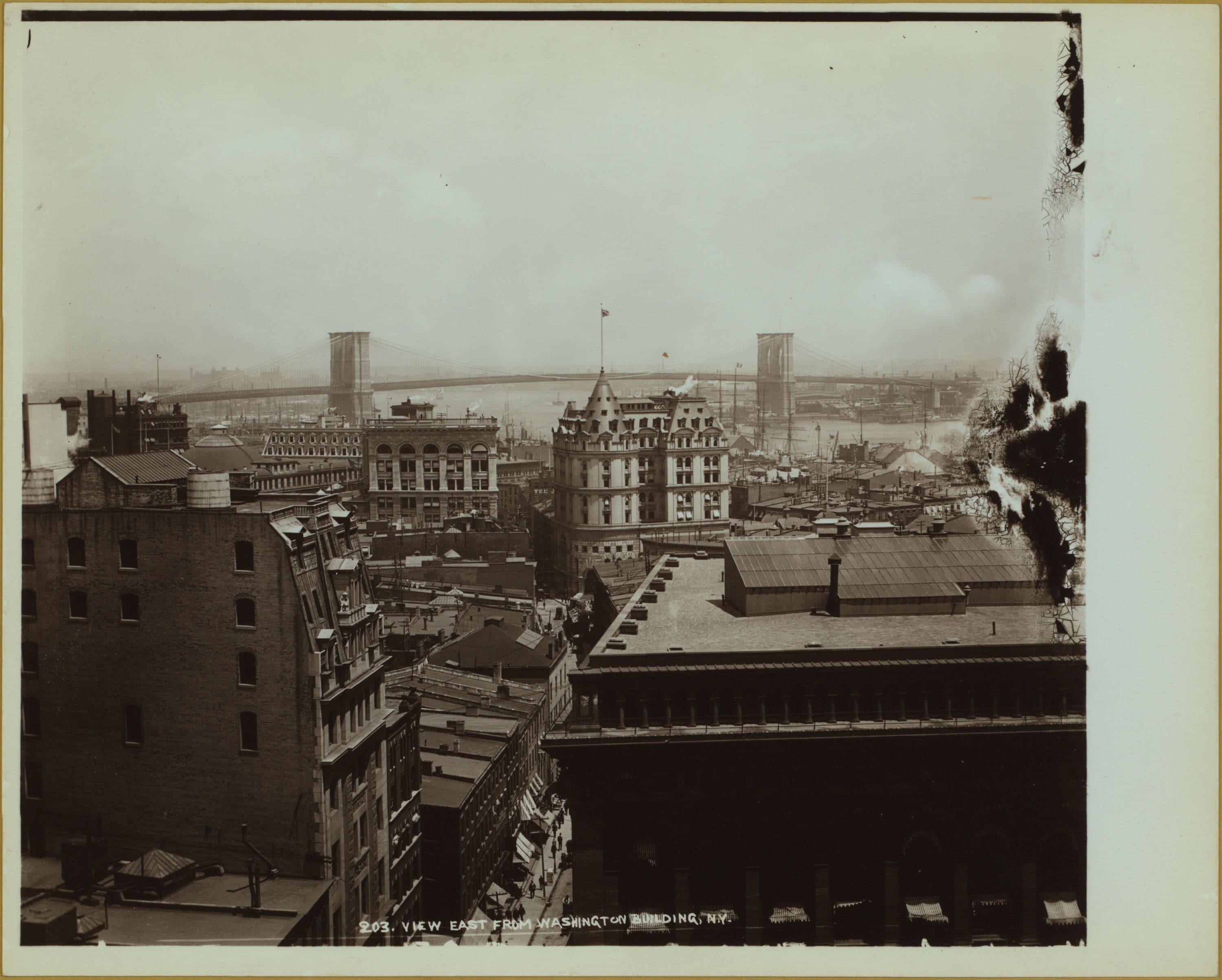 Bridges - Brooklyn Bridge - [View of the bridge spanning the East River between Manhattan and Brooklyn.]