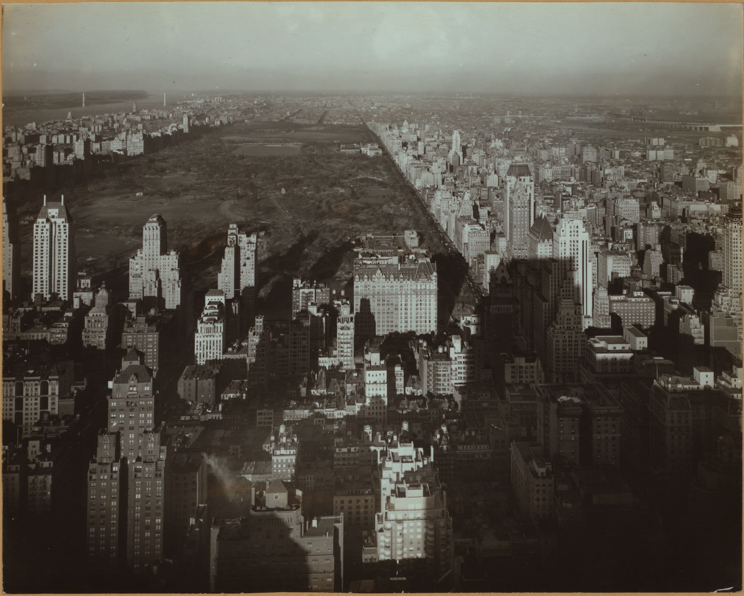 General view - [Midtown Manhattan - Rockefeller Plaza from R.C.A. Building.], 1936