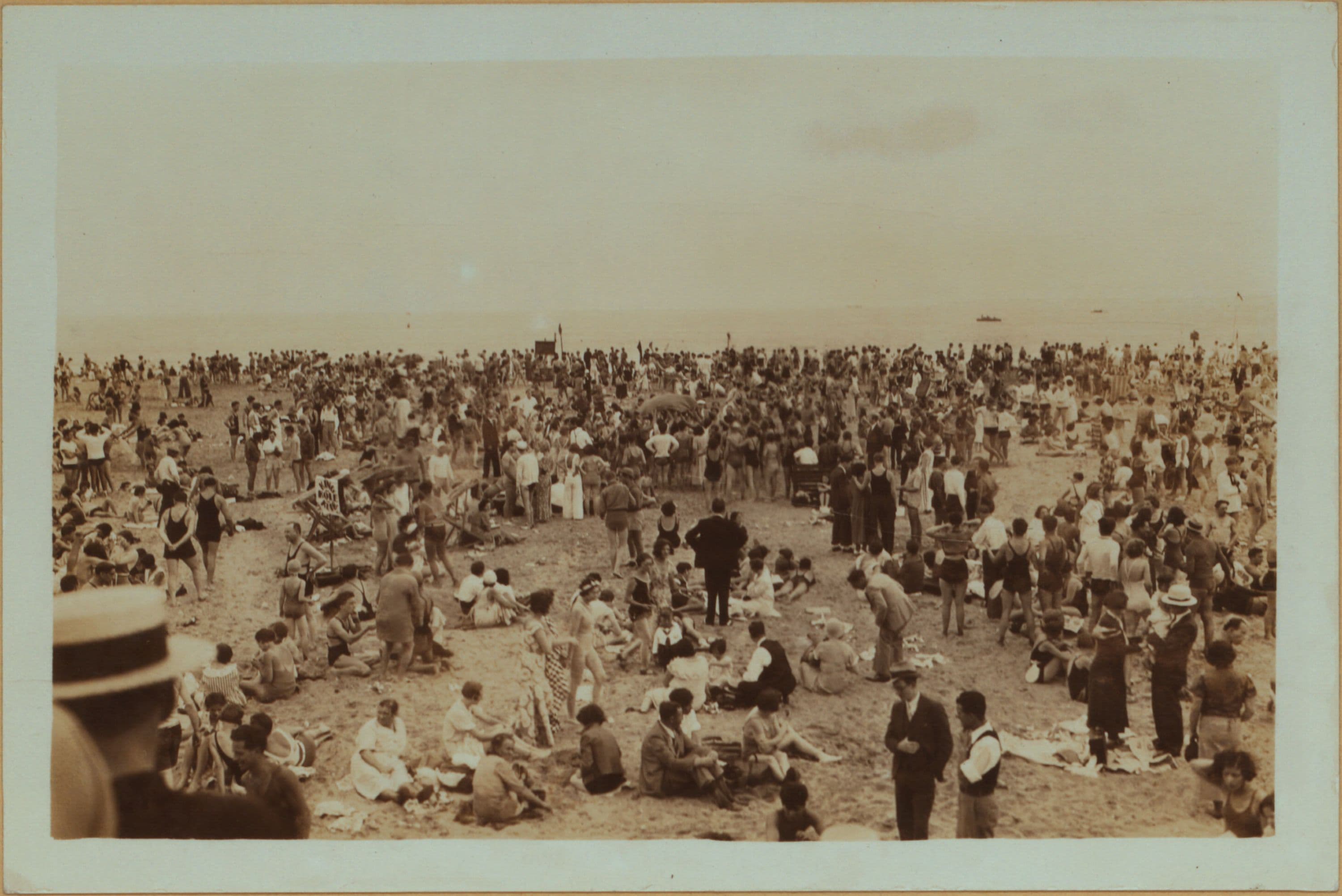Islands - Coney Island beach - [Sunbathers and swimmers.], 1933