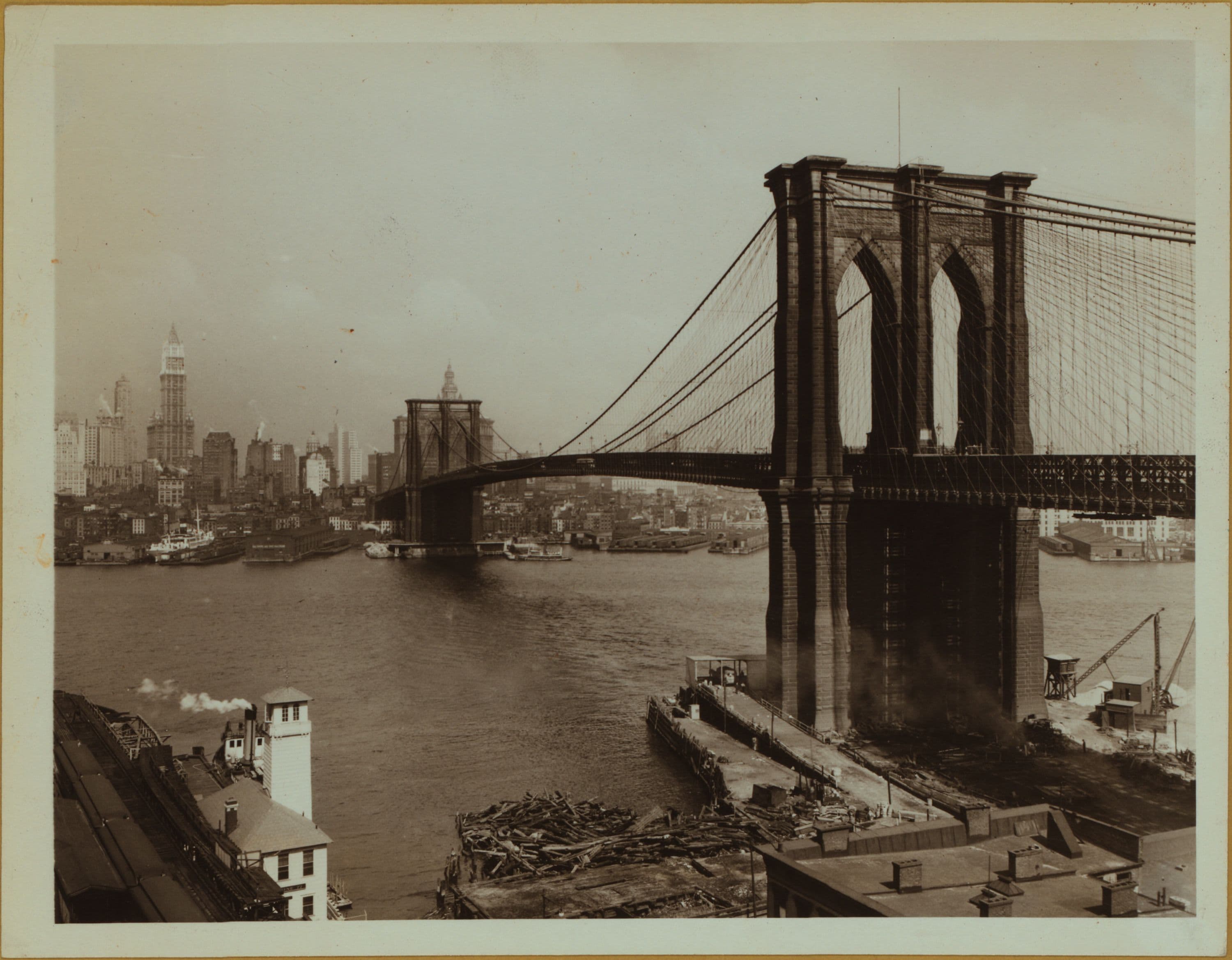 Bridges - Brooklyn Bridge - [View of the bridge over East River, as it stretches from Brooklyn to Manhattan.]