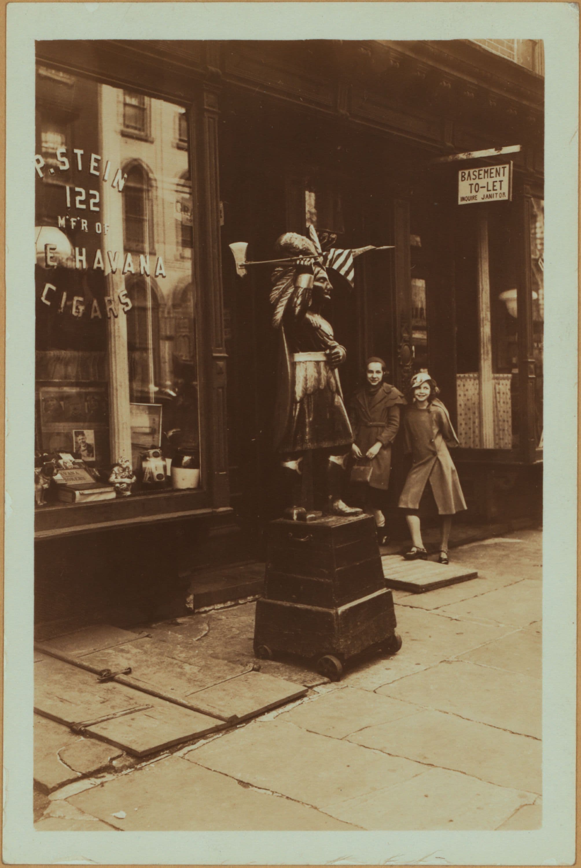 Street scenes - Cigar store - Indian. [Manhattan: 27th Street - 10th Avenue.]