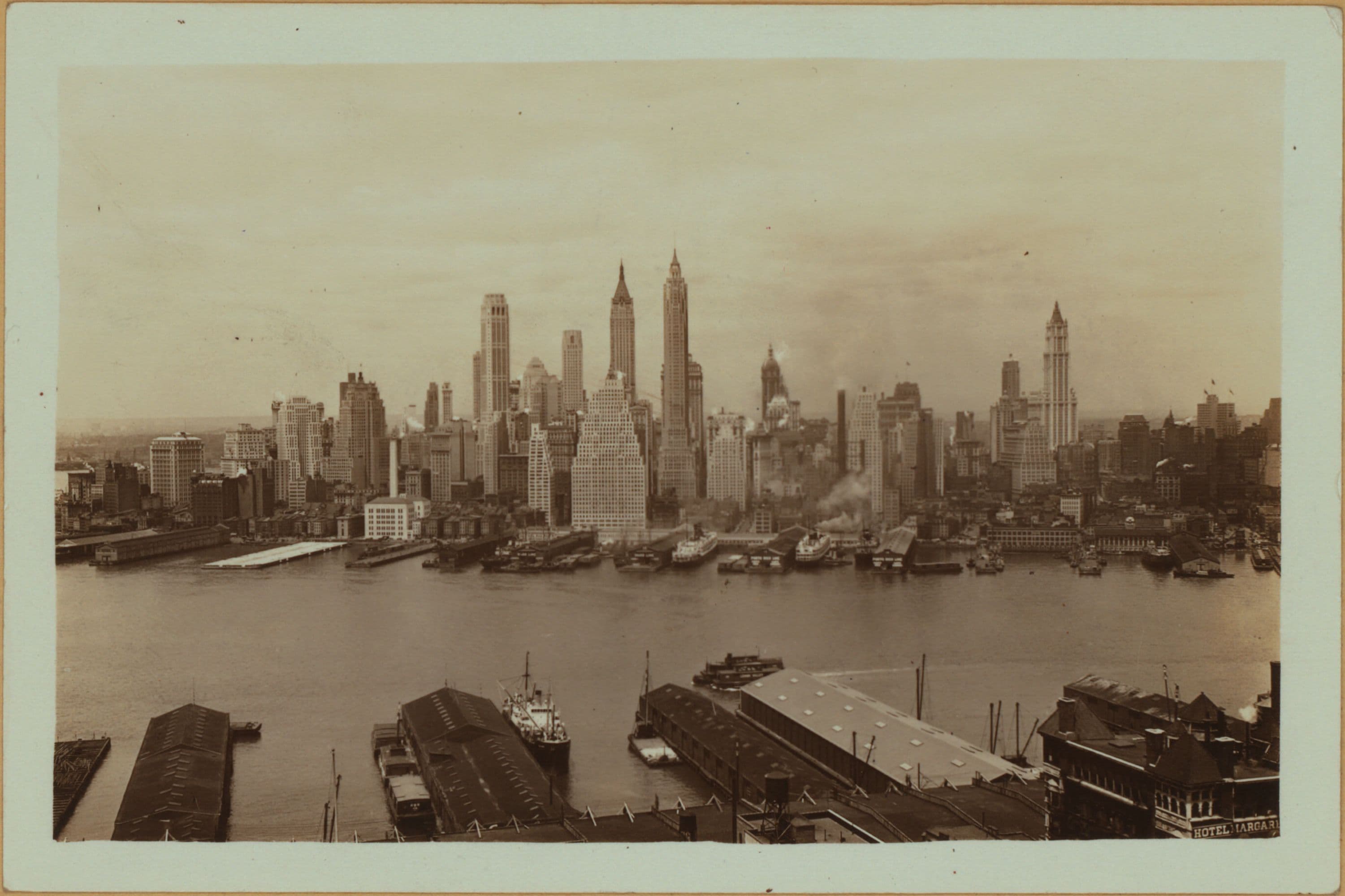 East River - Shore and skyline of lower Manhattan - South Ferry - Williamsburg Bridge - [Confluence of the East and North (Hudson) Rivers.]