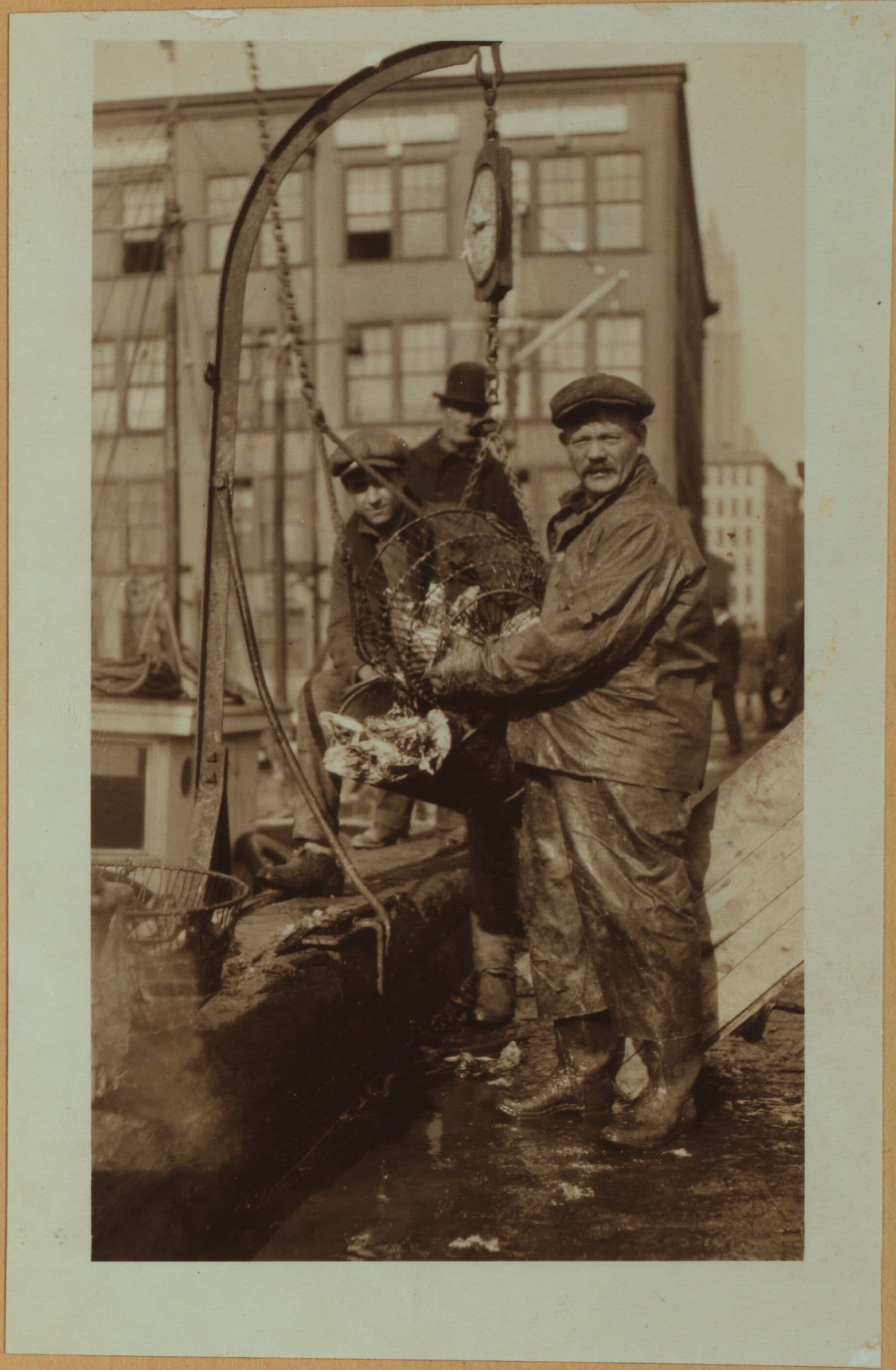 Fulton fish market - [North dock - Unloading and preparing cracked ice for the city's fish supply.]