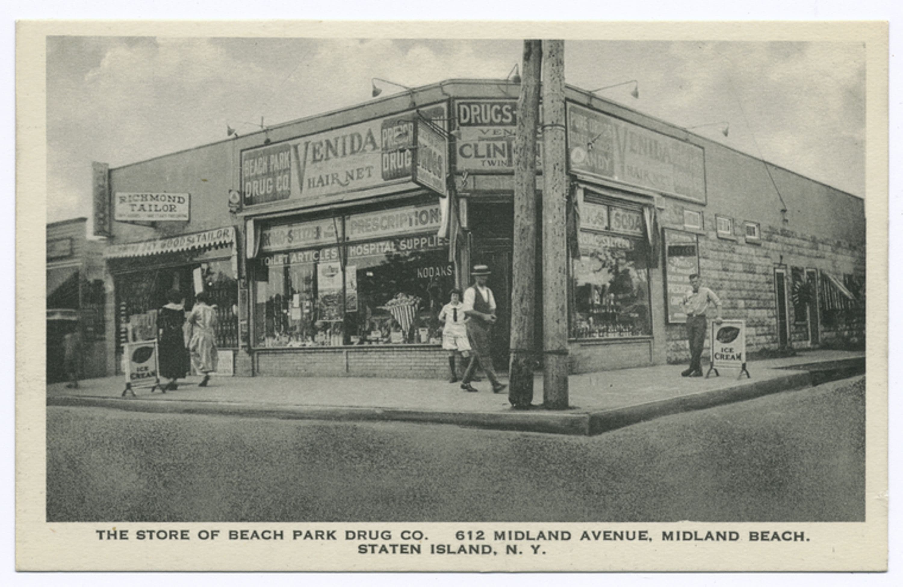 The Store of Beach Park Drug Co. 612 Midland Avenue, Midland Beach, Staten Island, N.Y. [corner store with people and ad signs on façade and window, i.e., Breyers, Bromo Seltzer, Kodaks: next store is Richmond Tailor, Pub. Beach Park Drug Co.]