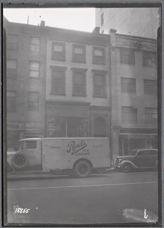 Brownstones & storefronts; M. Busi Dry Cleaning, Altenburg Pianos: 57-61 Fifth Av-E. 13th St, Manhattan, 1938