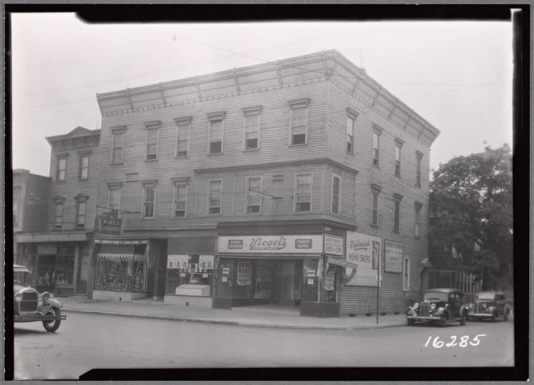 Wood buildings & storefronts; Kentucky Wine & Liquor, Siegel Hosiery: 98-06 Jamaica Ave.?, Queens