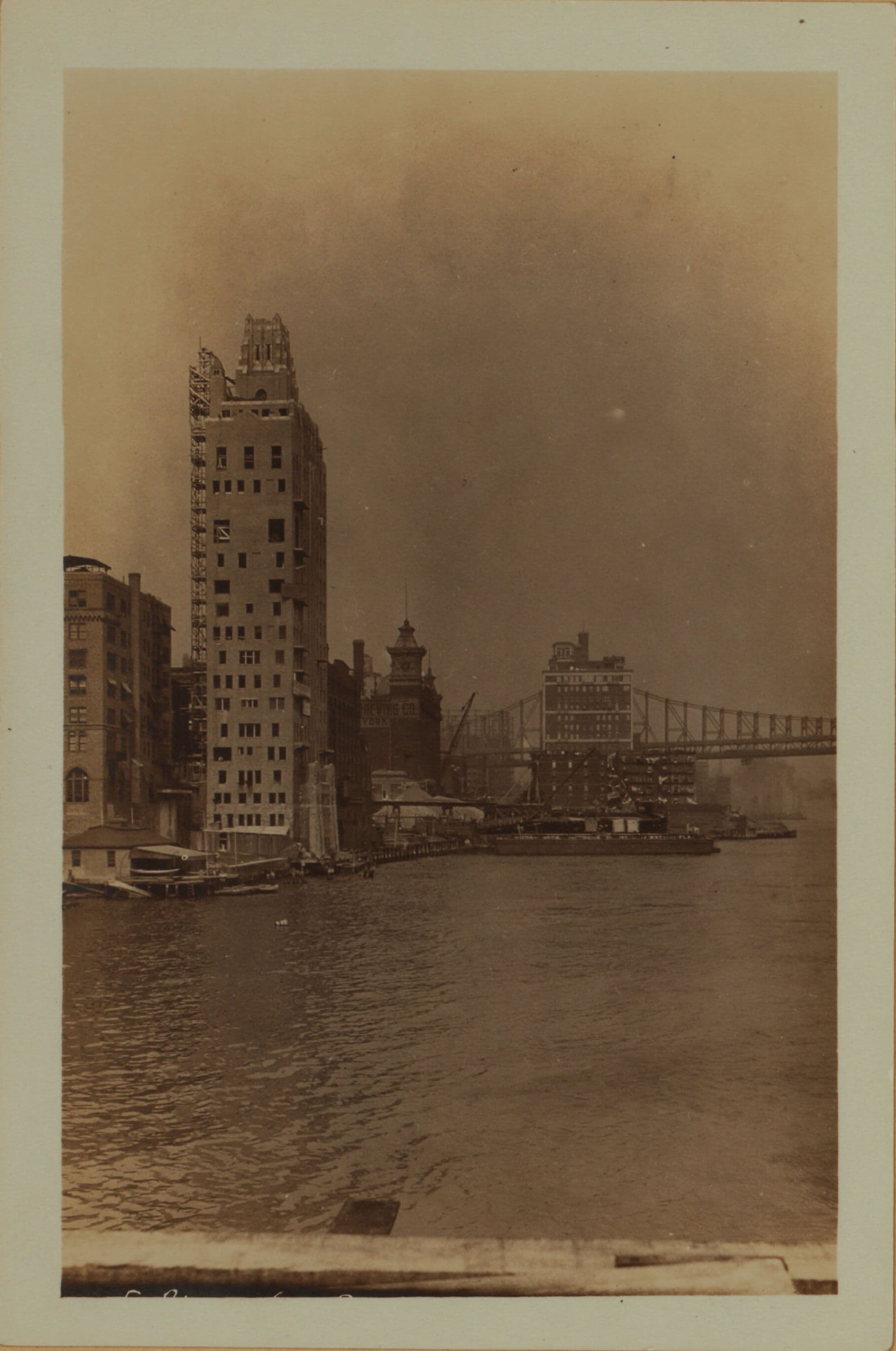 East River - Shore and skyline of Manhattan from East 51st Street - Williamsburg and Queensborough Bridges - [River House; Consumers Brewing Company.]