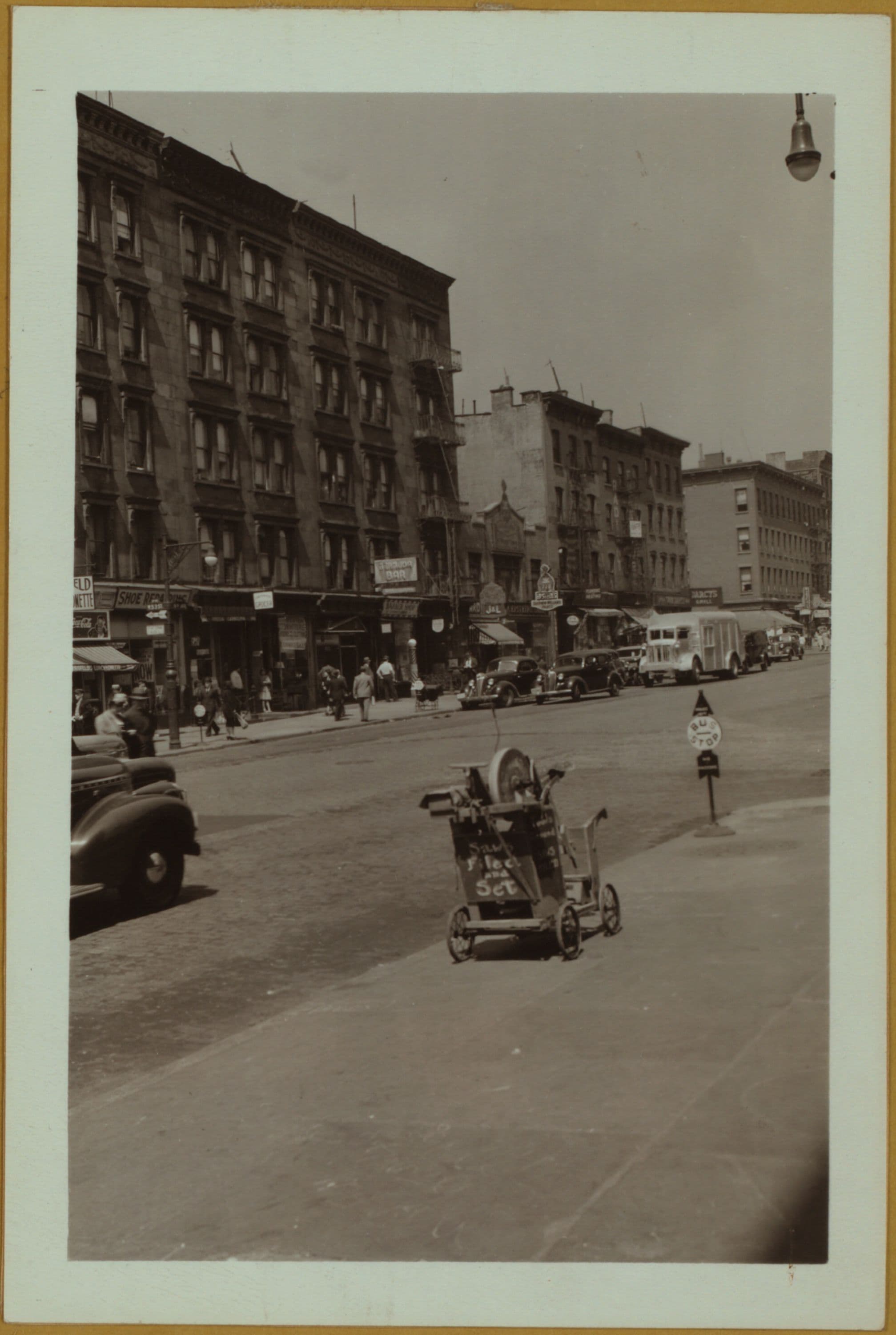 Occupations - Grinder. Left: Knife grinder, Lower East Side. Right: A saw and knife filer, Nineth Avenue and 54th Street, Manhattan.