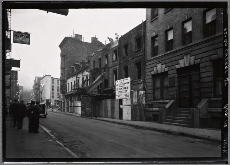 Salvation Army Settlement House and demolitions in progress: 82-90 Cherry St-James St-Oliver St, Manhattan, 1934
