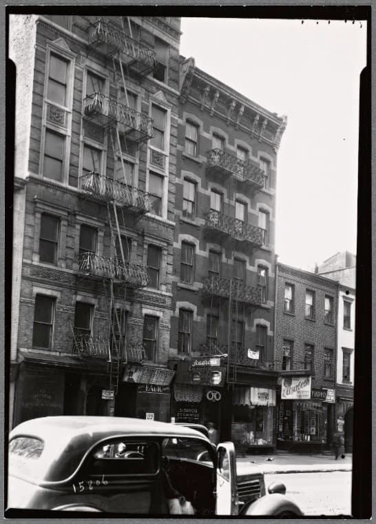 Tenements & storefronts; Scandron's Opticians: 399-403 Grand St.-Clinton-Suffolk, Manhattan, 1936