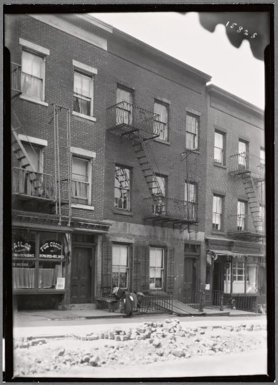 Tenement row; Jos. Mickus Tailor: 75-79 Hudson Ave-Front-Water St., Brooklyn, 1936