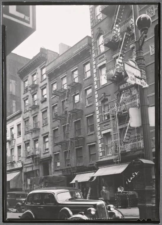 Street view with tenements and residents: Hester St. - Eldridge St., Manhattan, 1936