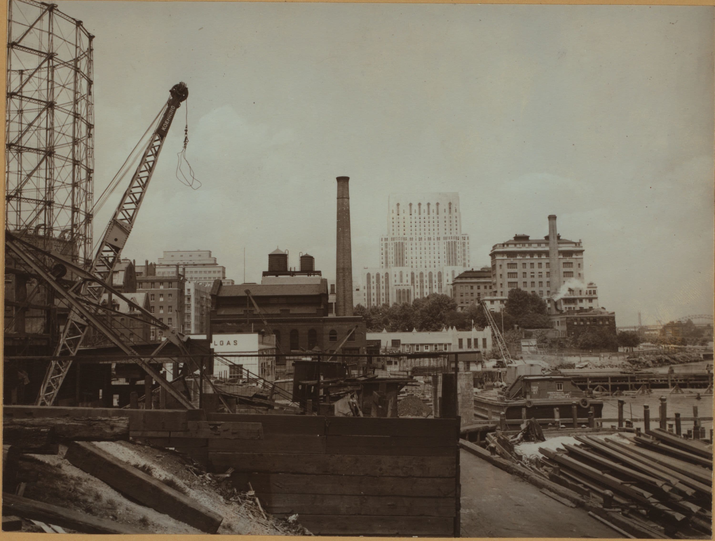 East River - Shore and skyline of Manhattan from East 61st Street - Williamsburg and Queensborough Bridges.